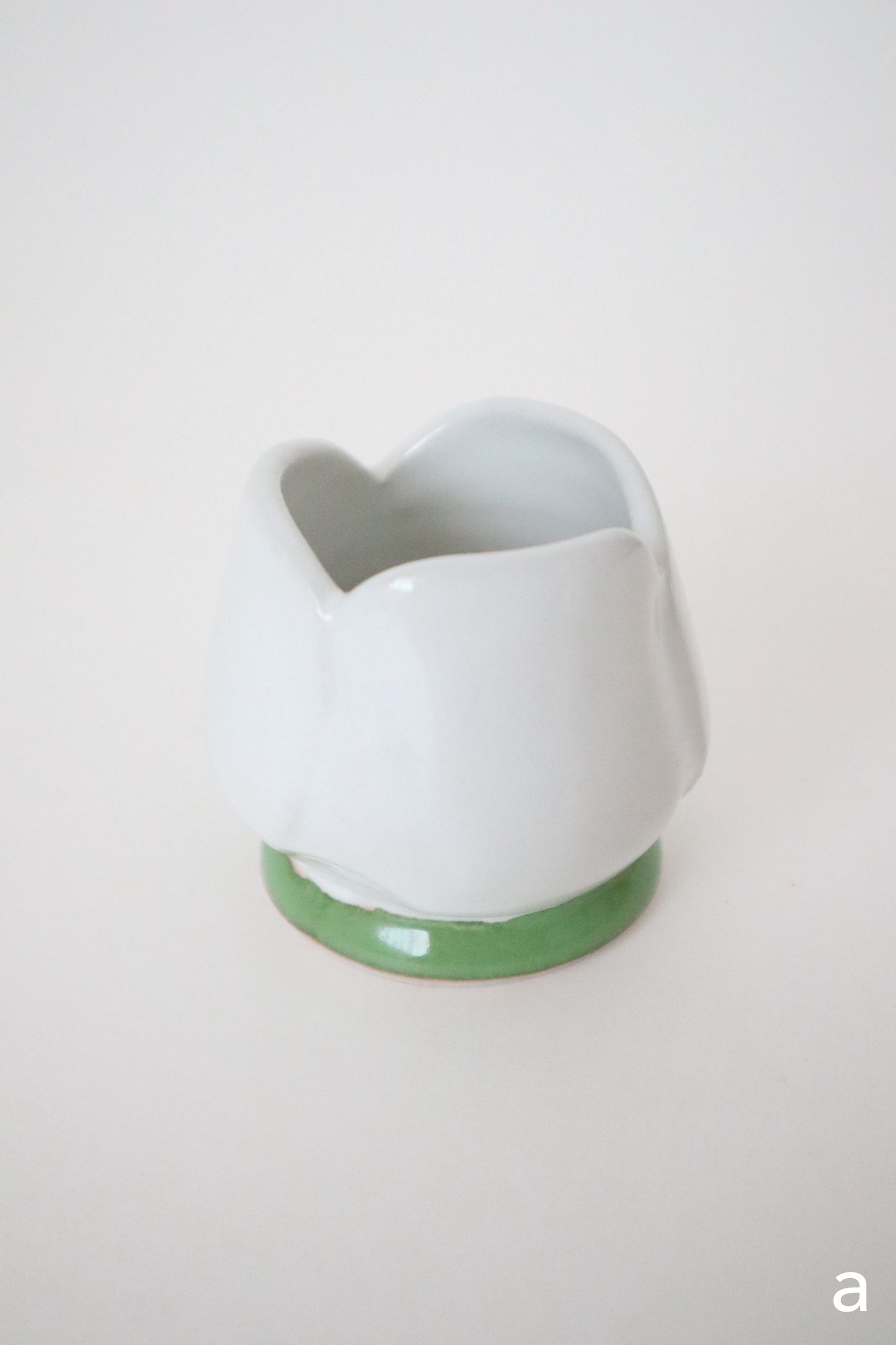 white bloom whisk holders