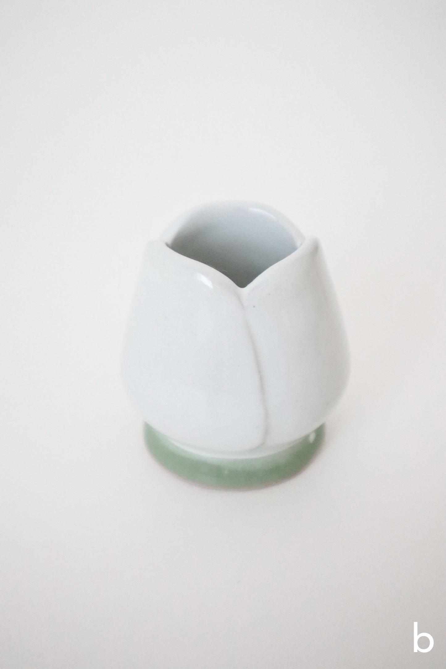 white bloom whisk holders