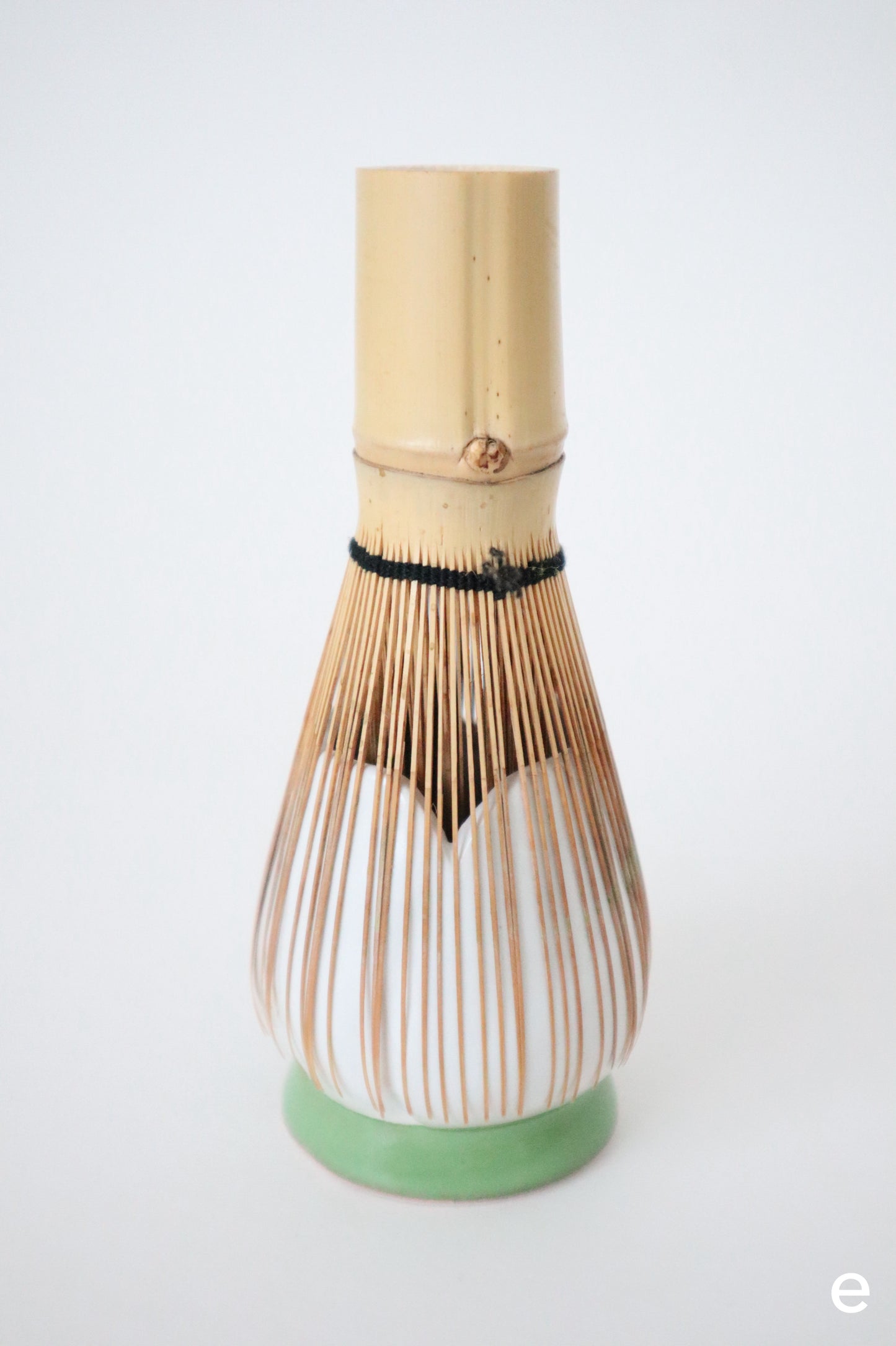 white bloom whisk holders