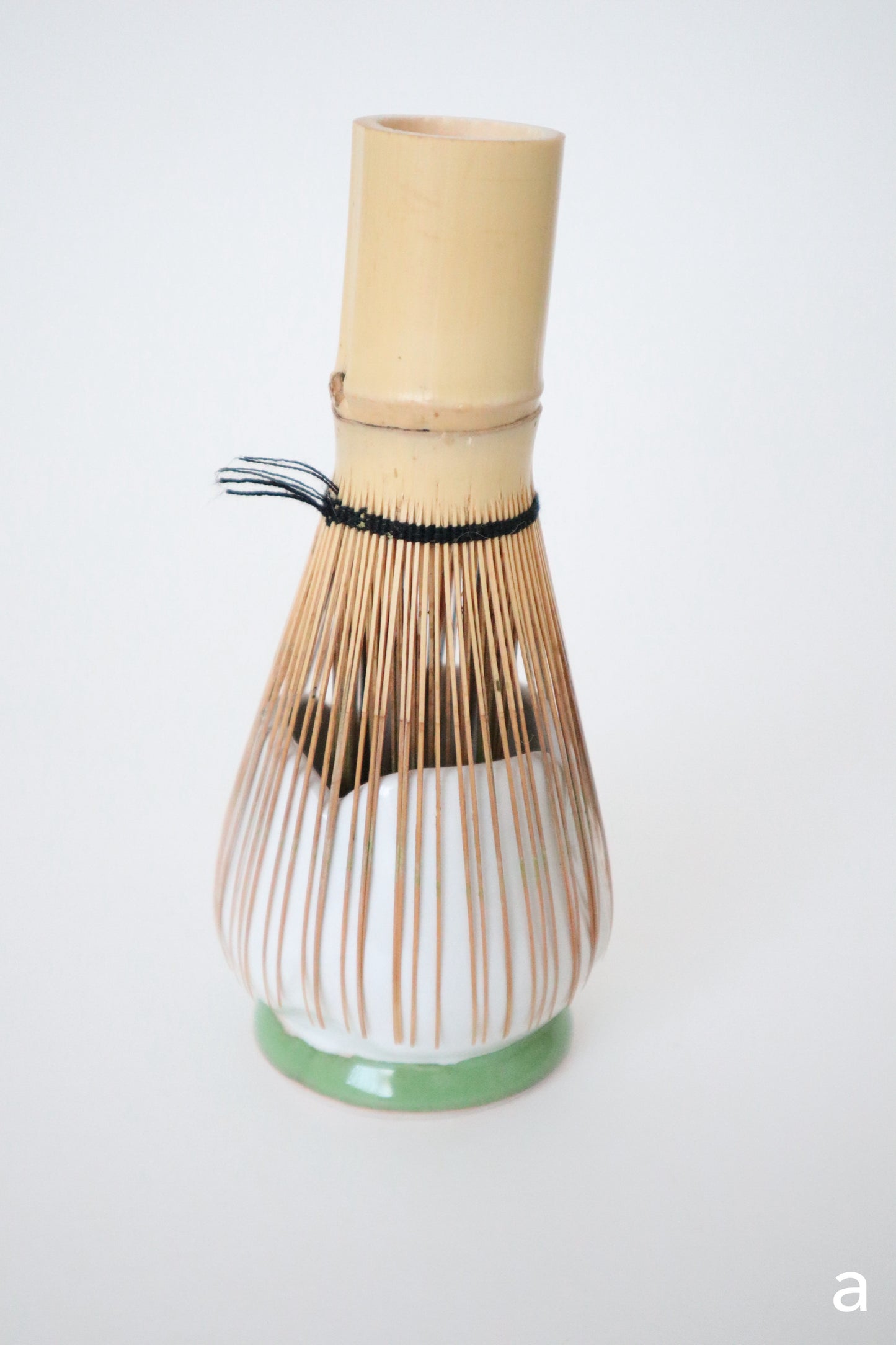 white bloom whisk holders