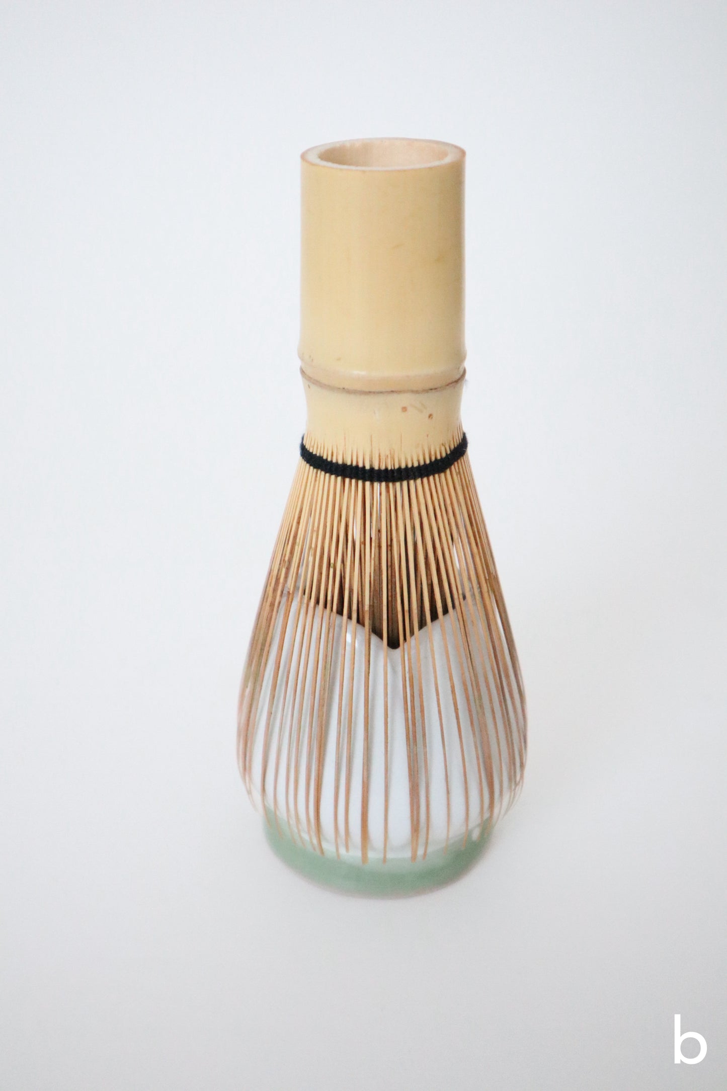 white bloom whisk holders