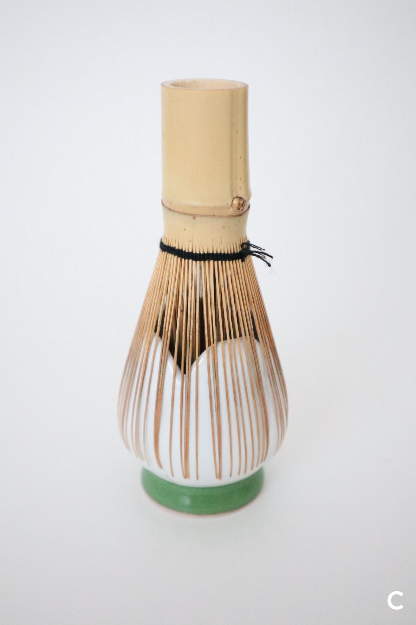white bloom whisk holders