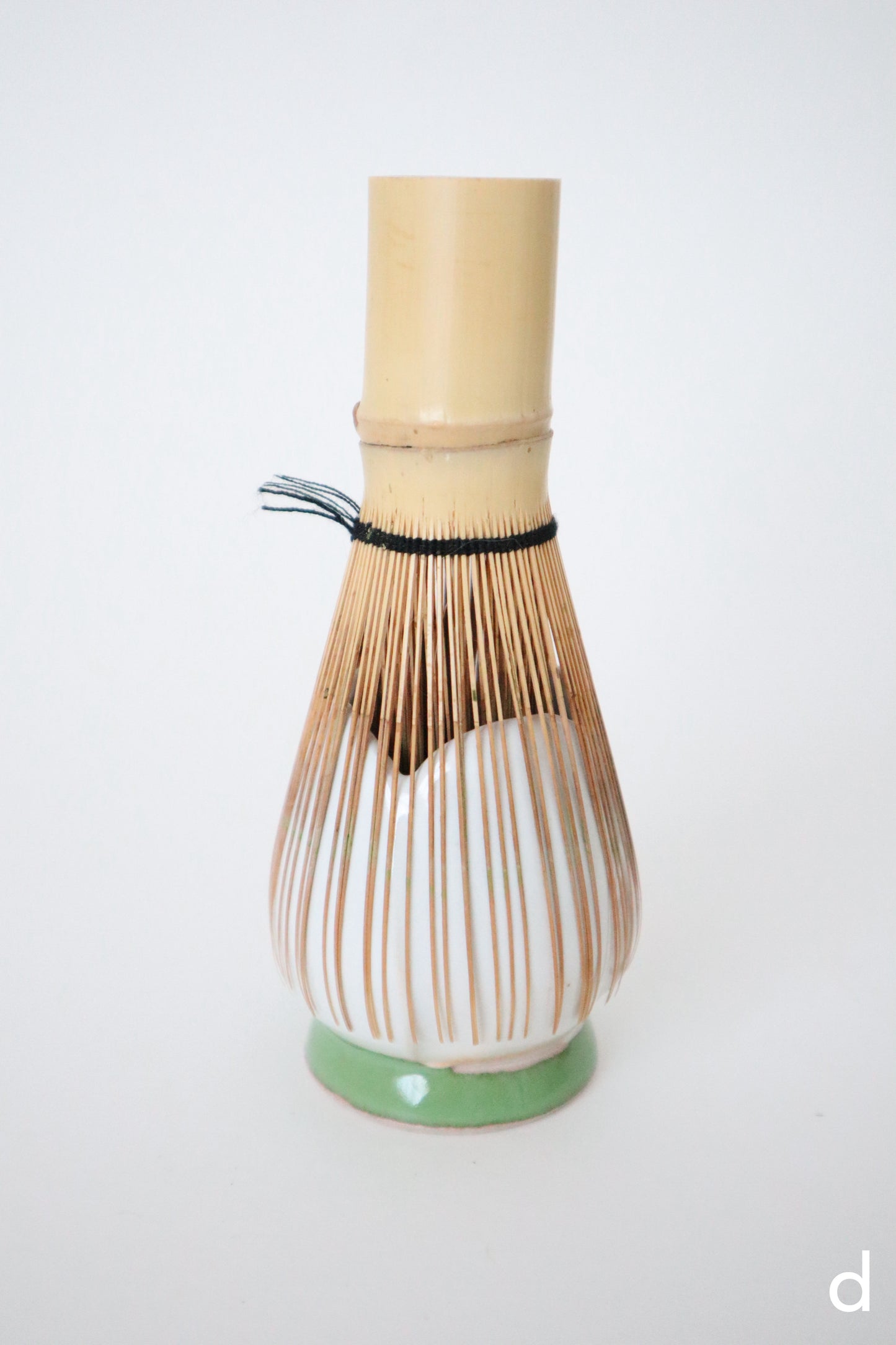 white bloom whisk holders