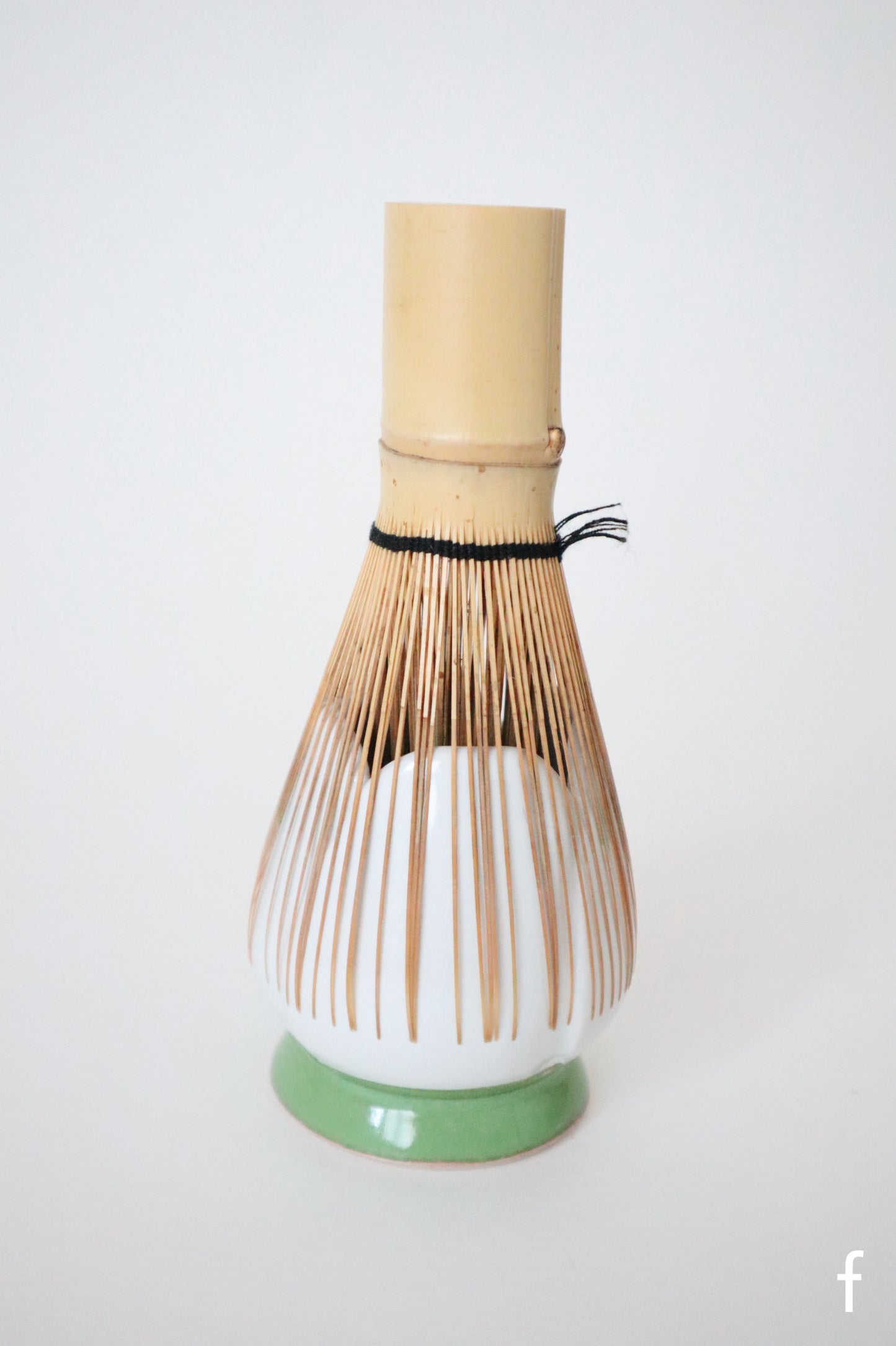 white bloom whisk holders