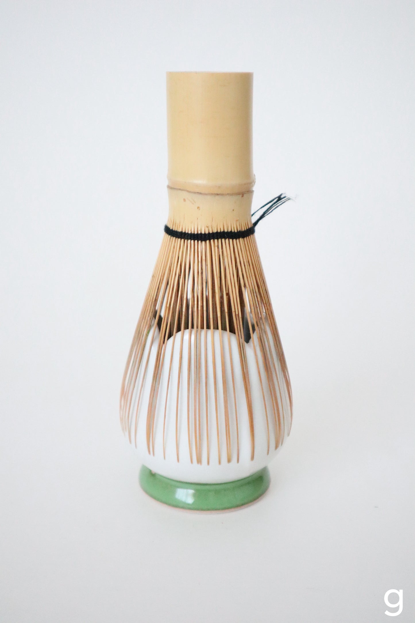 white bloom whisk holders