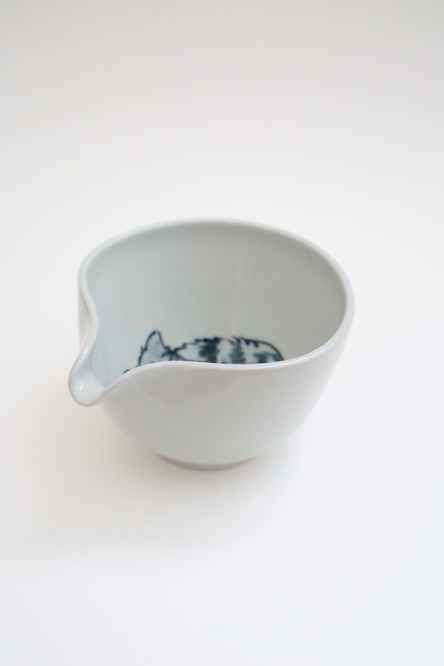 Harry the cat in matcha bowl