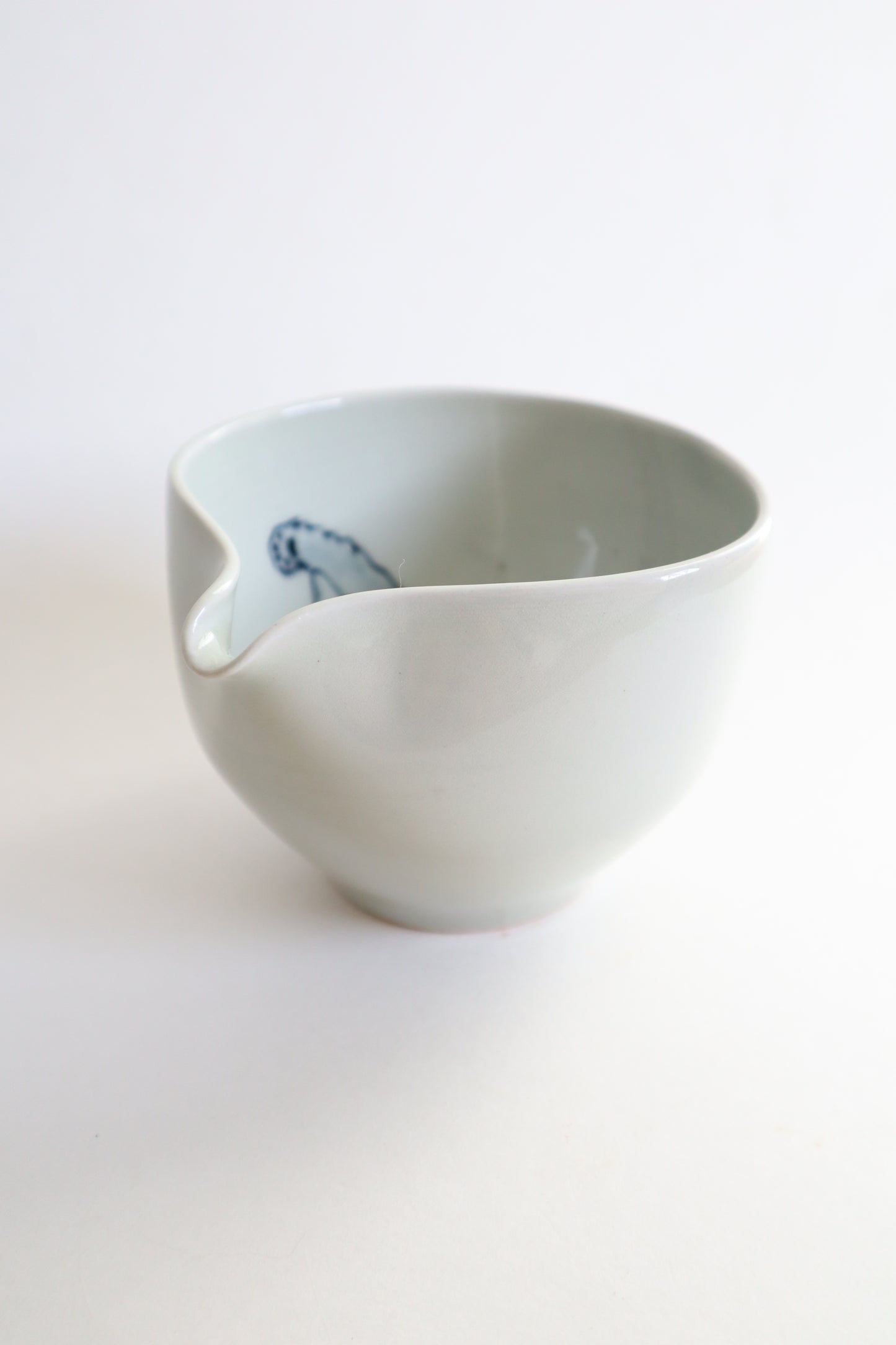 Boo the cat in matcha bowl