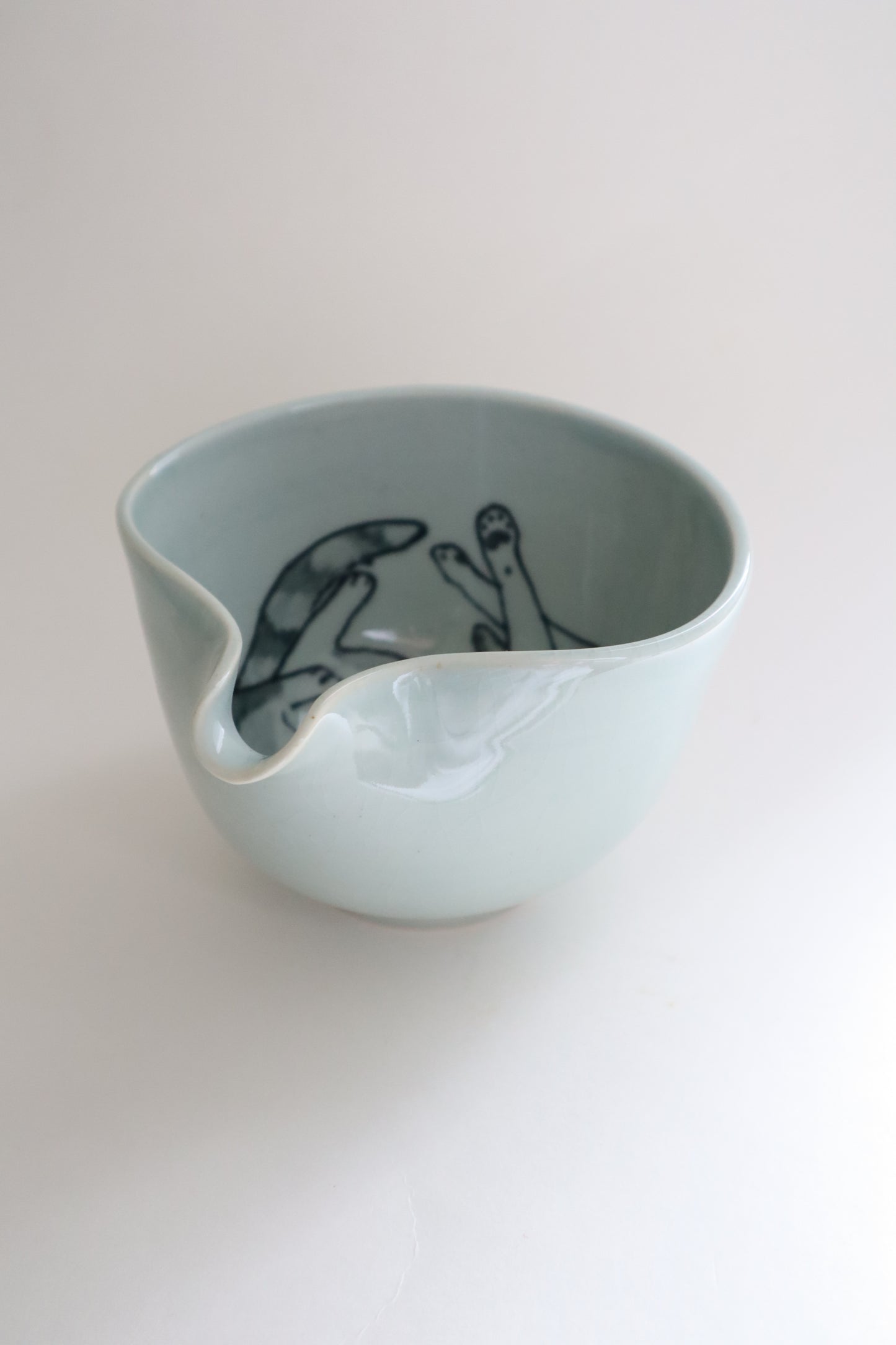 Felix the cat in matcha bowl