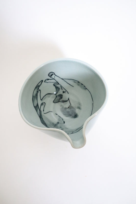 Felix the cat in matcha bowl