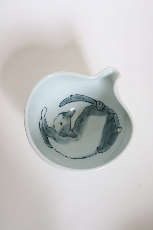 Noodle the cat in matcha bowl
