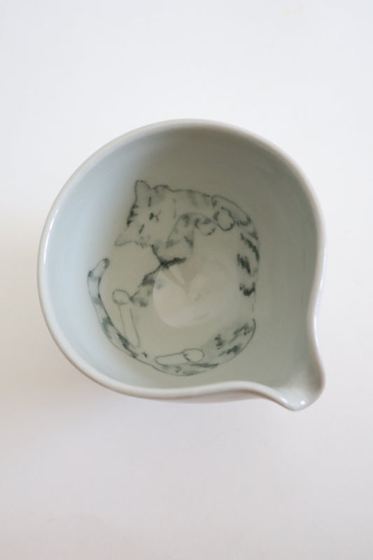 Loki the cat in matcha bowl